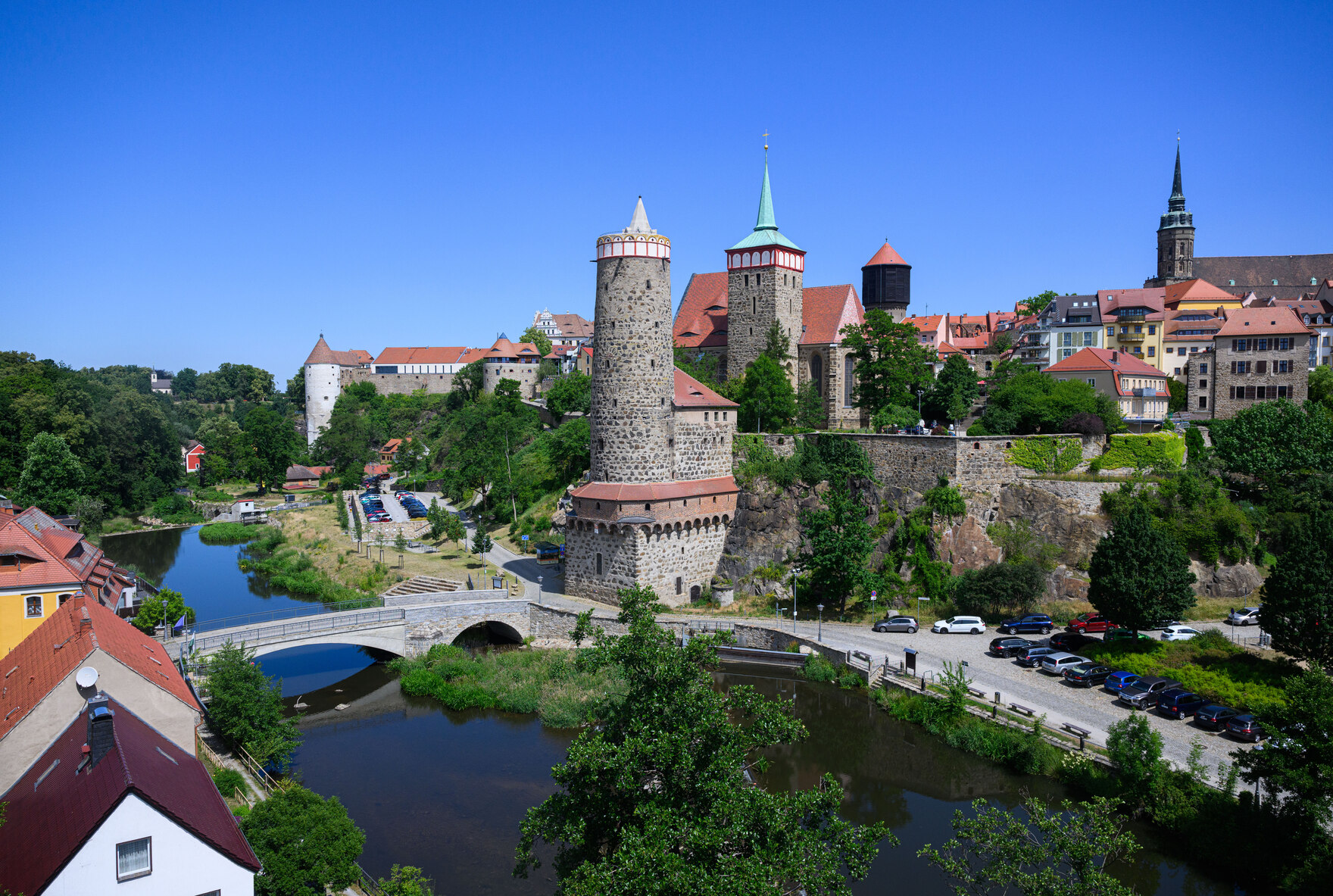 An old town in front of a blue sky